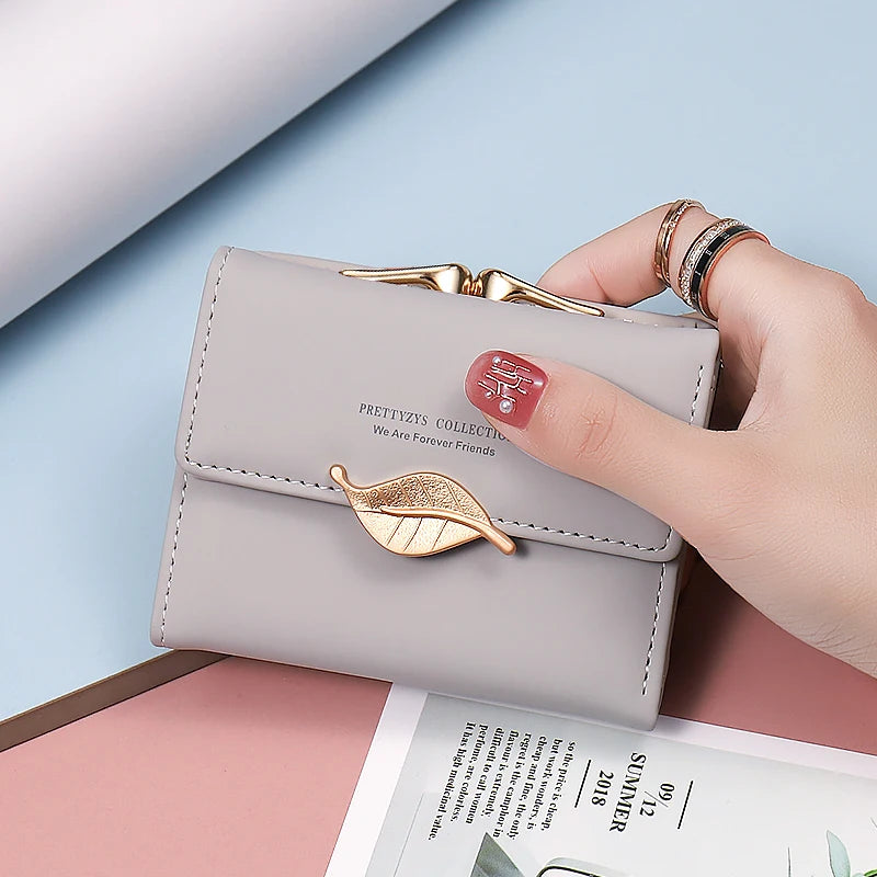 New purse Female Japan and South Korea small fresh PU solid color three fold bag multi-card folding large capacity coin student