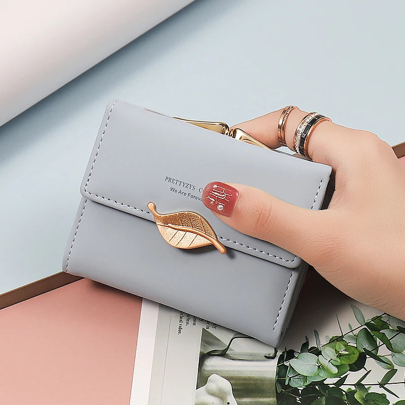 New purse Female Japan and South Korea small fresh PU solid color three fold bag multi-card folding large capacity coin student